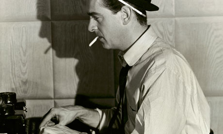 Newspaper reporter at typewriter